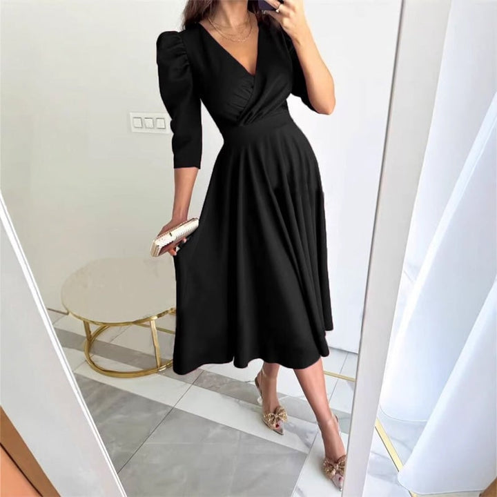 Woman wearing elegant wrap midi dress
