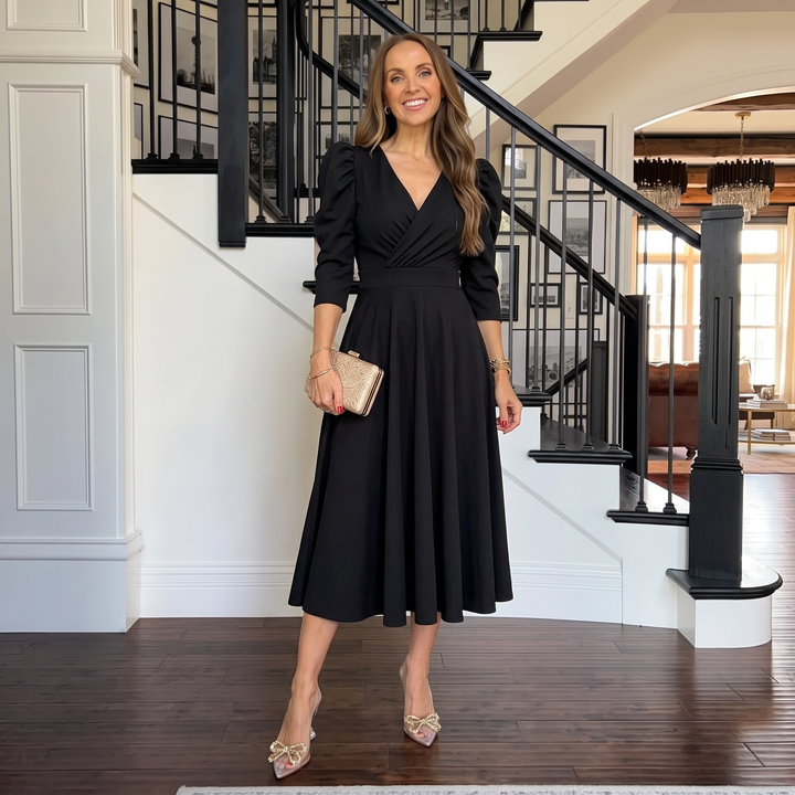 Woman wearing elegant wrap midi dress