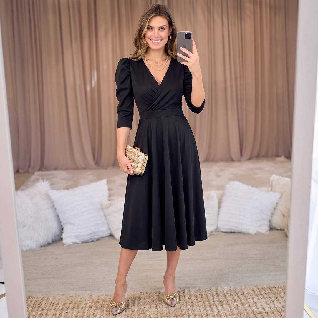 Woman wearing elegant wrap midi dress