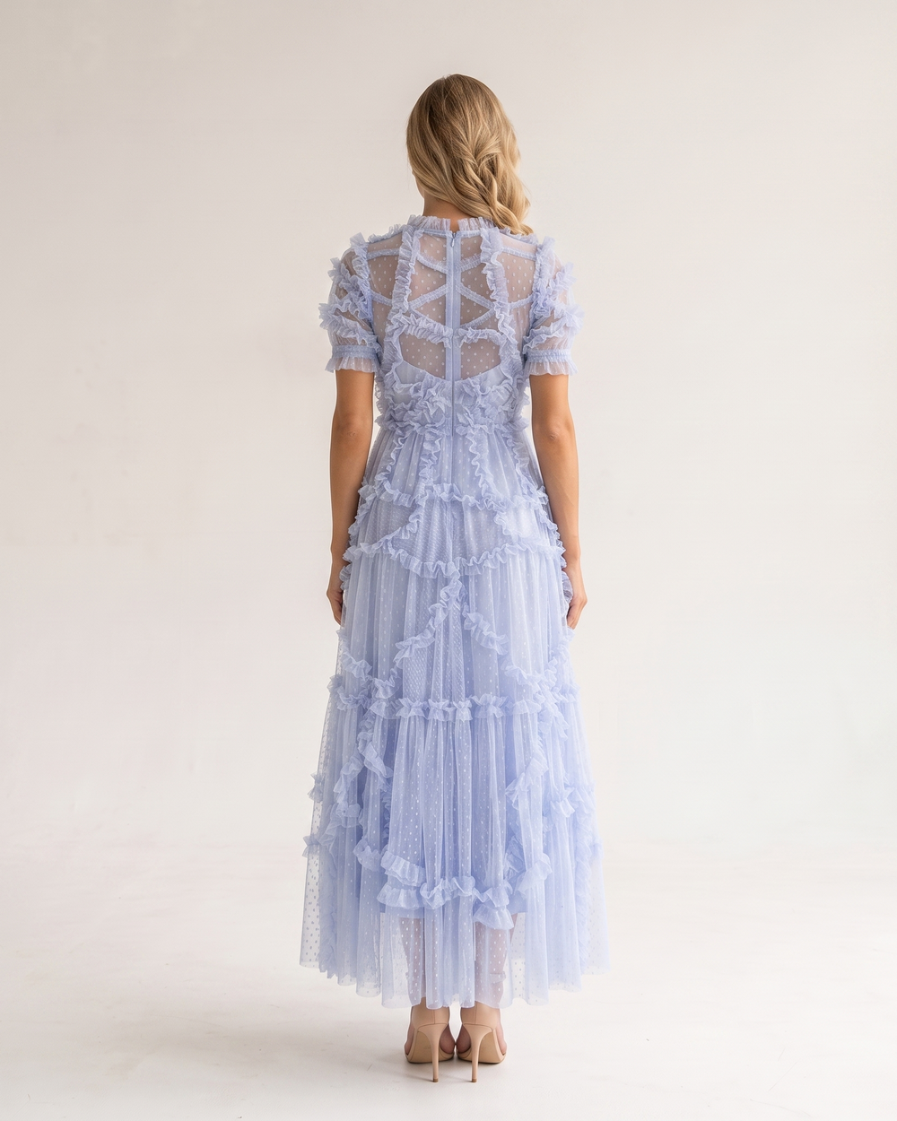 Woman wearing romantic ruffle maxi dress