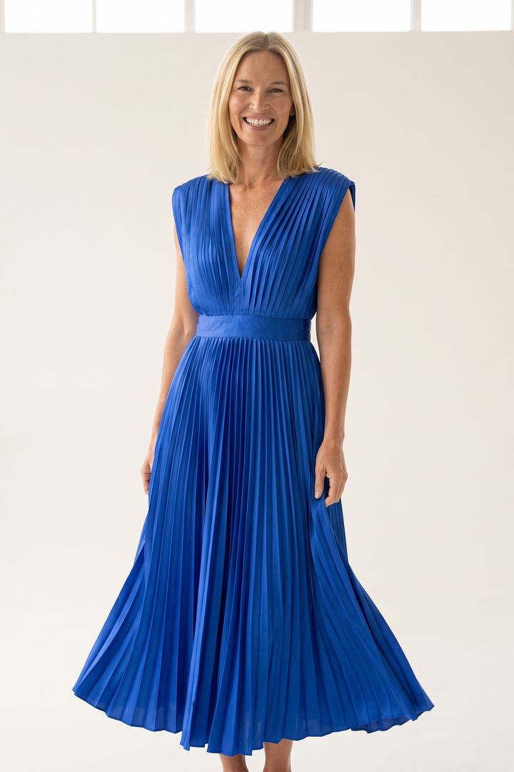 Woman wearing pleated satin midi dress