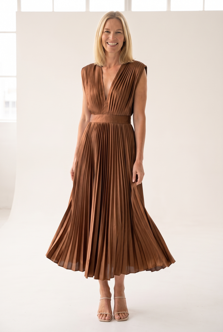 Woman wearing pleated satin midi dress