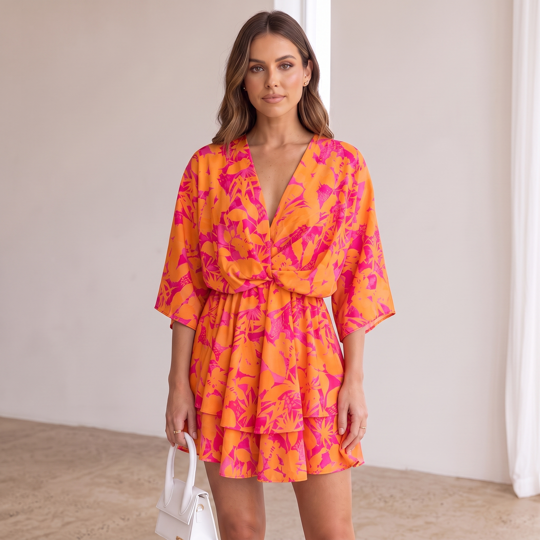 Woman wearing vibrant ruffle mini dress