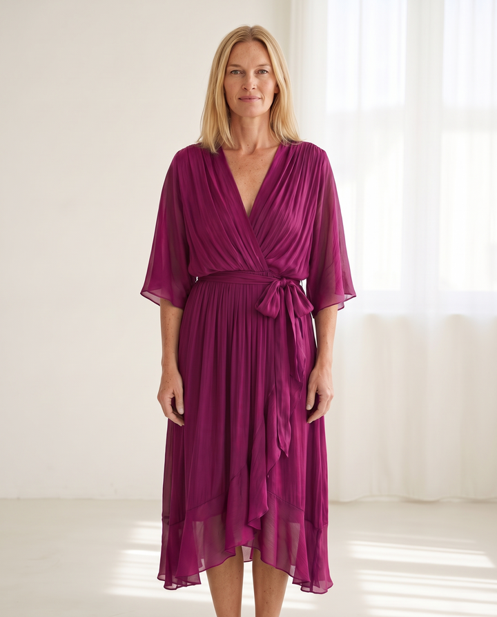 Woman wearing elegant wrap maxi dress