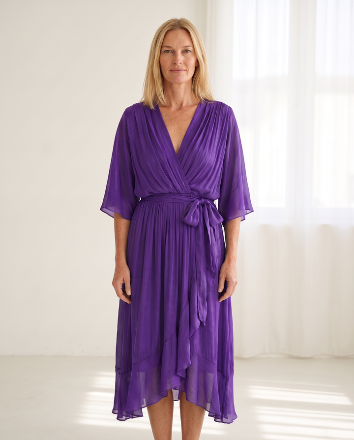 Woman wearing elegant wrap maxi dress