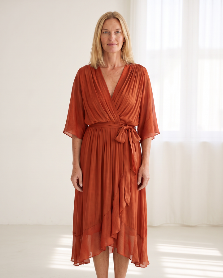 Woman wearing elegant wrap maxi dress
