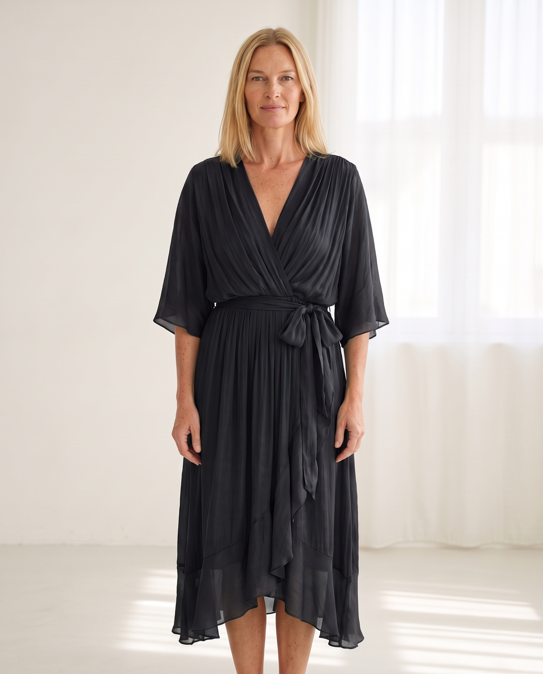 Woman wearing elegant wrap maxi dress