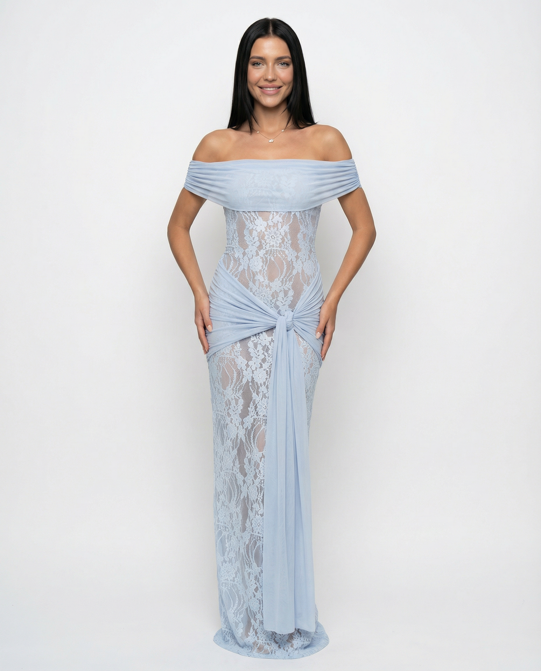 Woman wearing off-shoulder lace maxi dress
