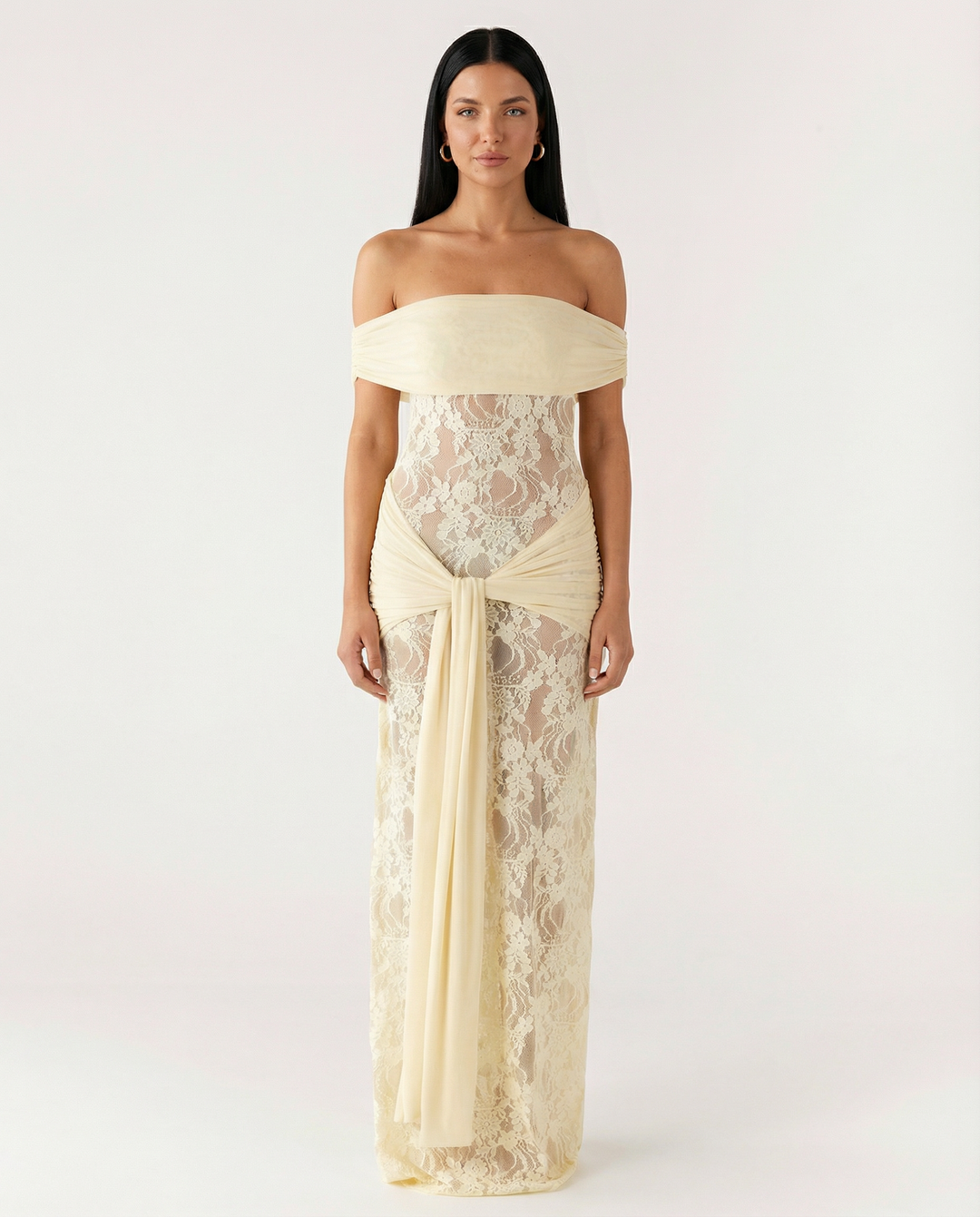 Woman wearing off-shoulder lace maxi dress