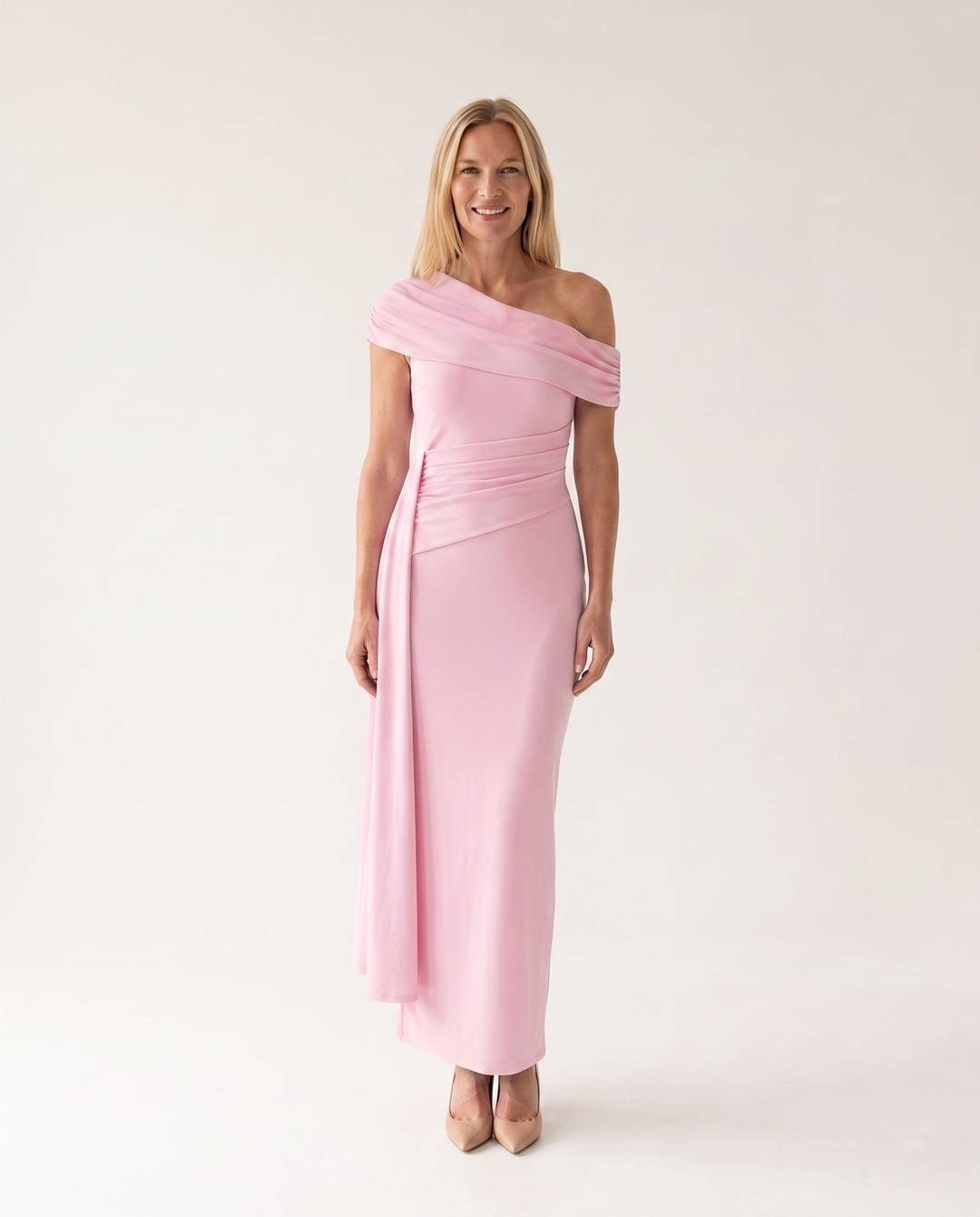 Woman wearing elegant off shoulder maxi dress