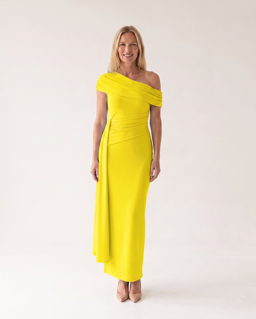 Woman wearing elegant off shoulder maxi dress