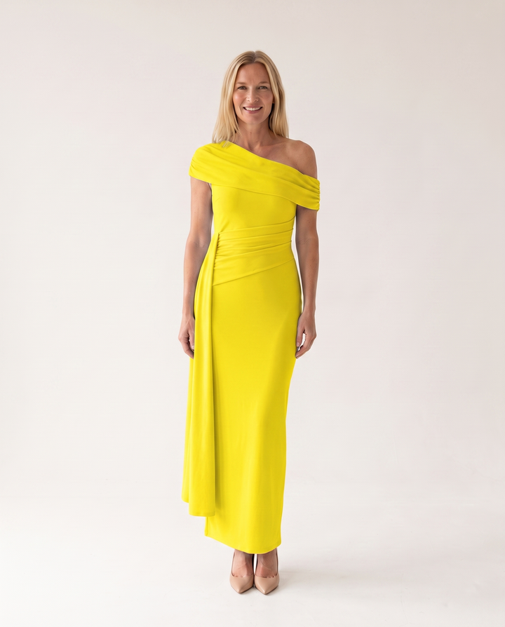 Woman wearing elegant off shoulder maxi dress