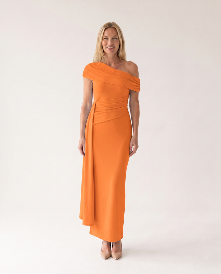Woman wearing elegant off shoulder maxi dress