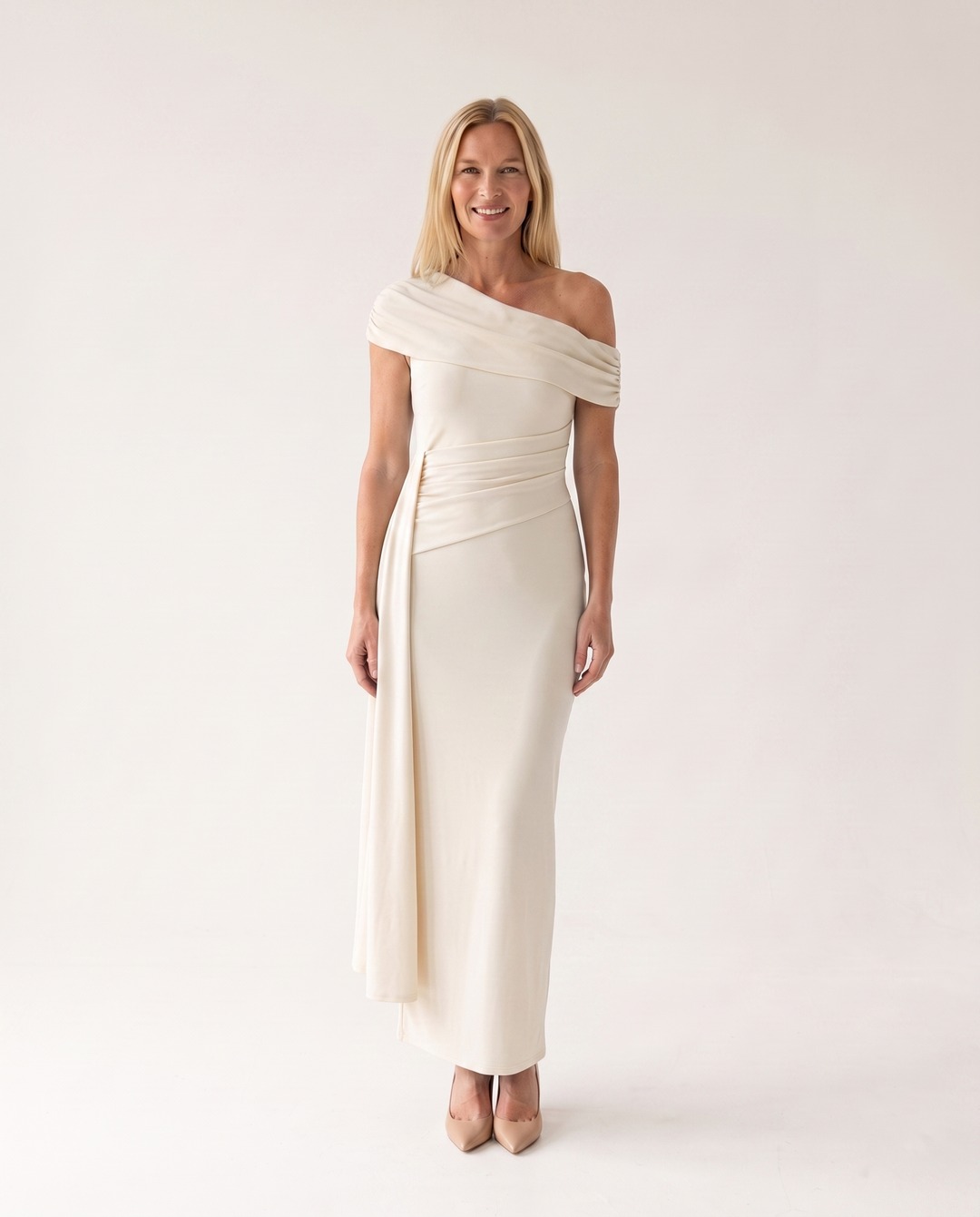 Woman wearing elegant off shoulder maxi dress