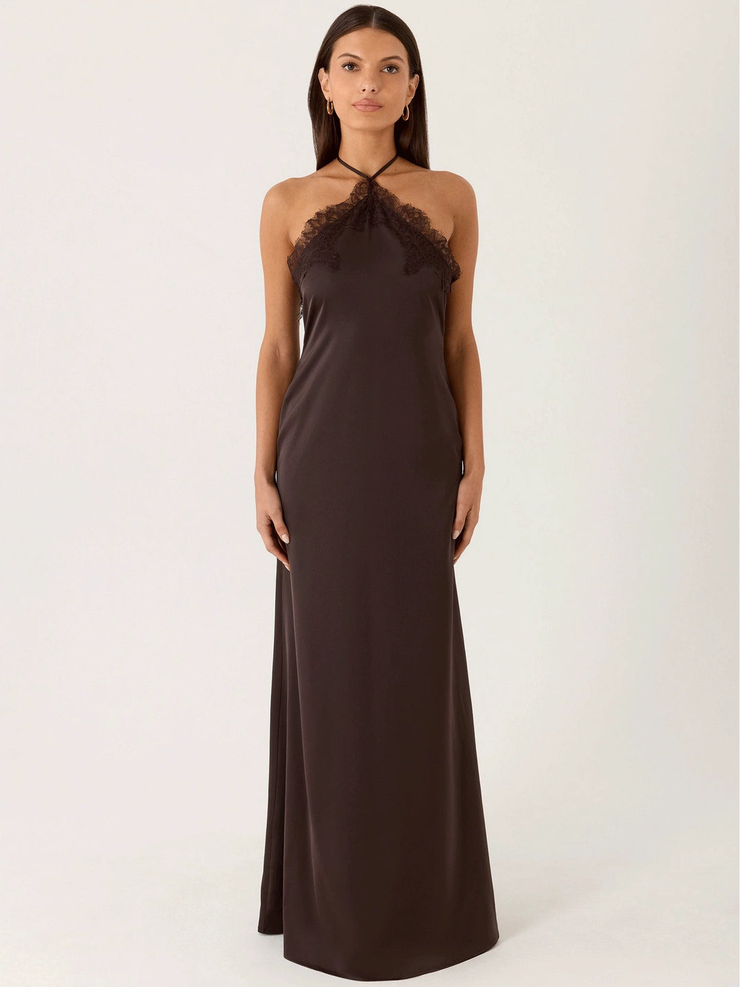 Woman wearing lace halter maxi dress