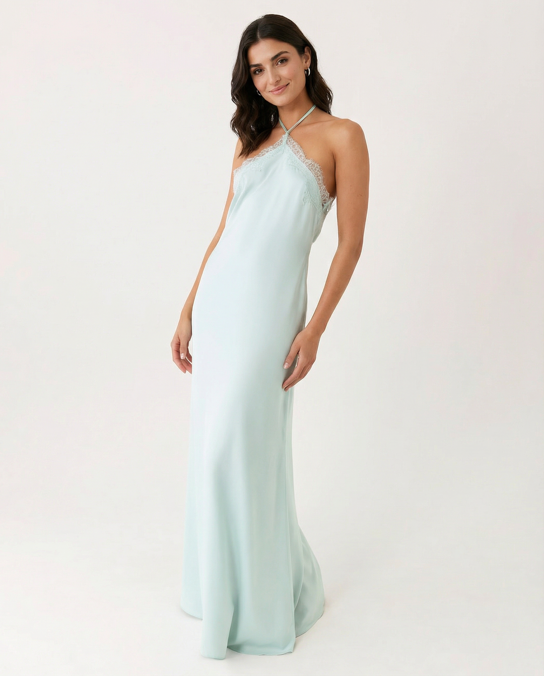 Woman wearing lace halter maxi dress