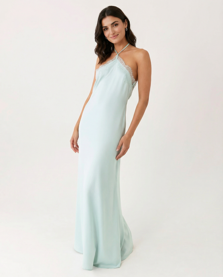 Woman wearing lace halter maxi dress