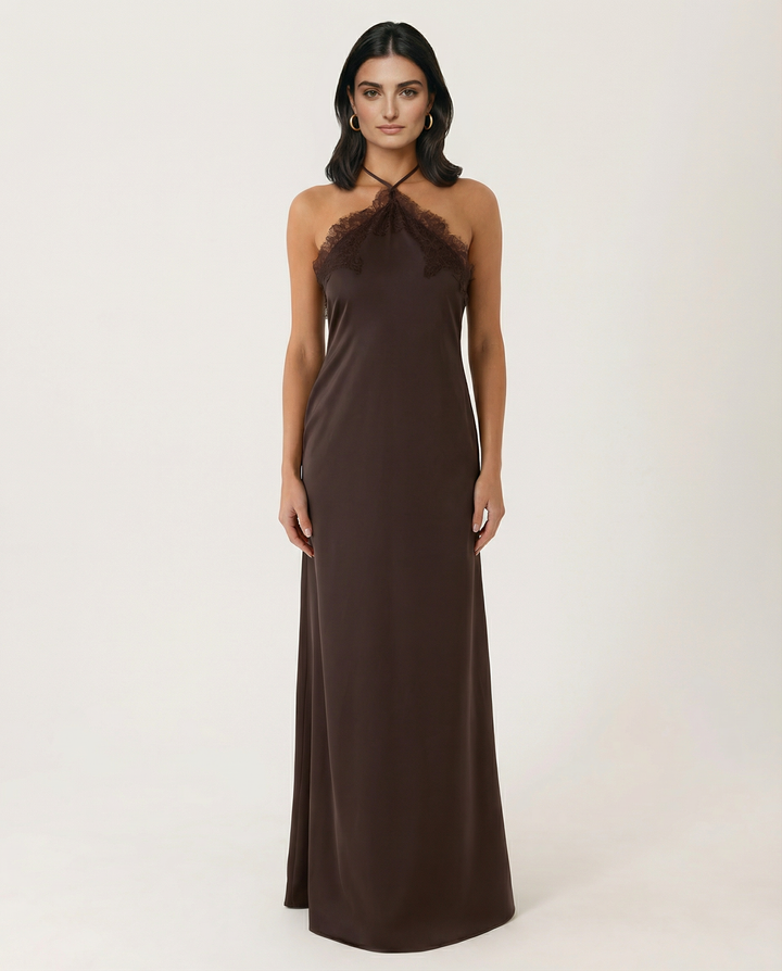 Woman wearing lace halter maxi dress