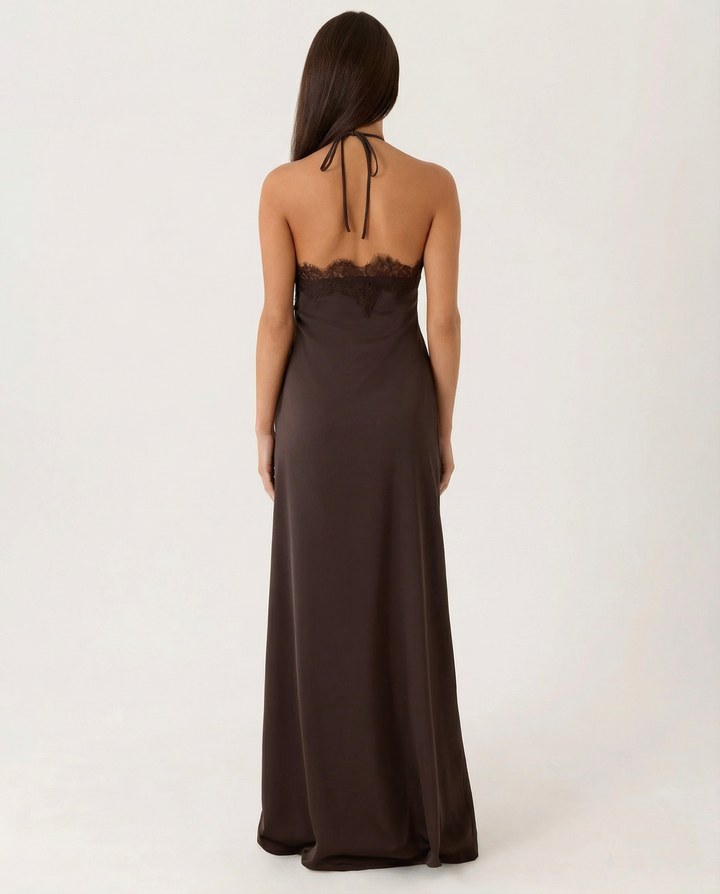 Woman wearing lace halter maxi dress
