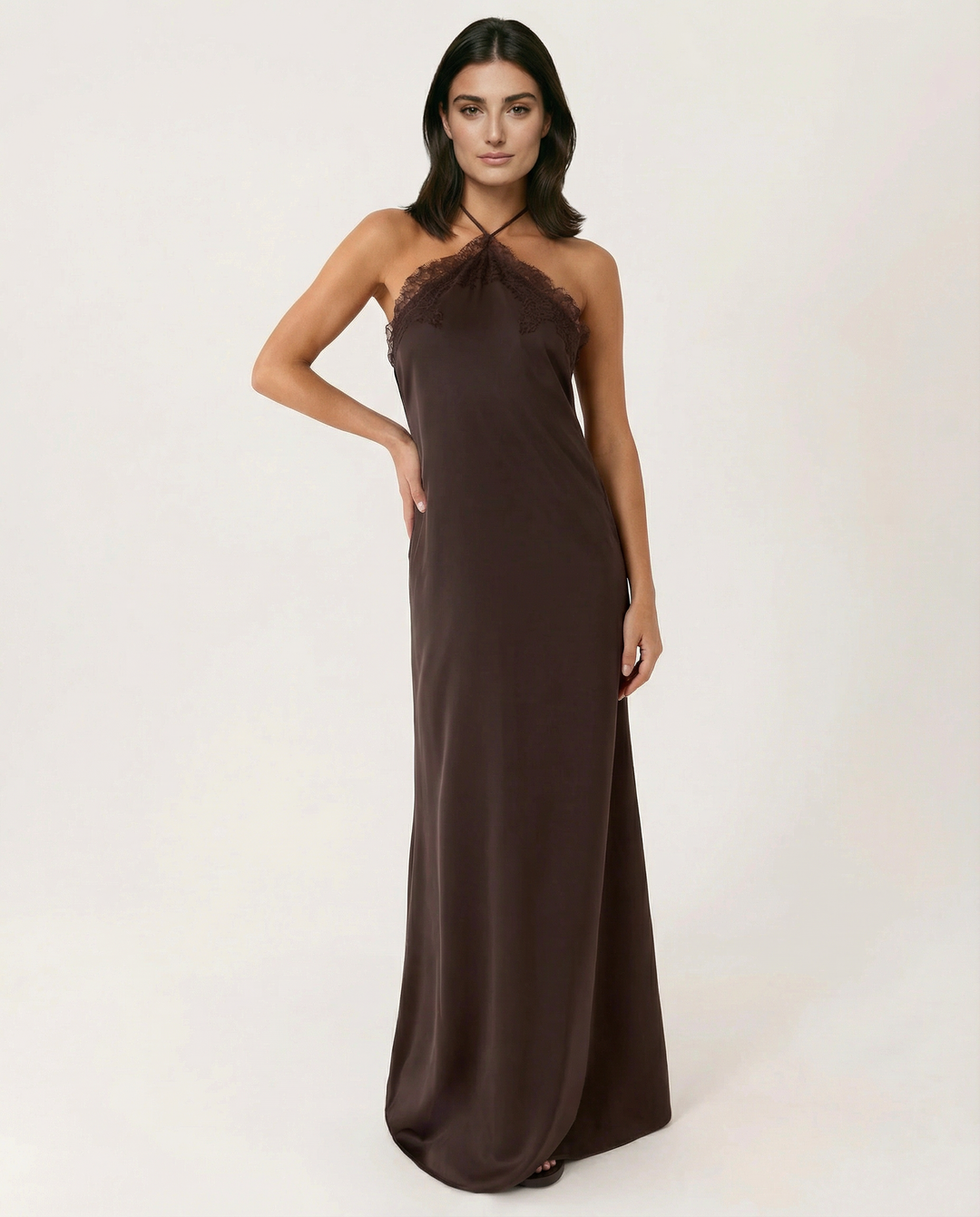 Woman wearing lace halter maxi dress