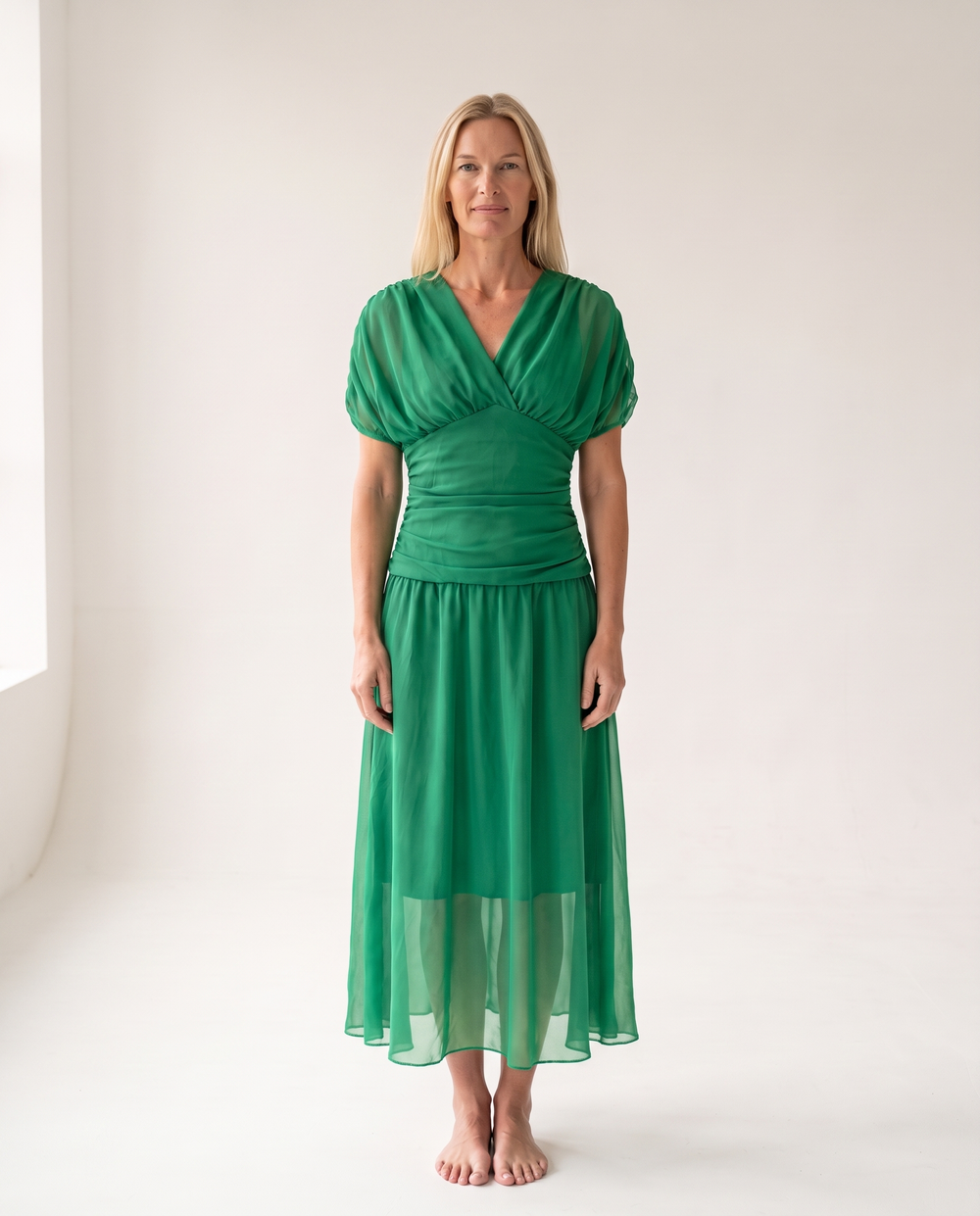 Woman wearing off shoulder maxi dress