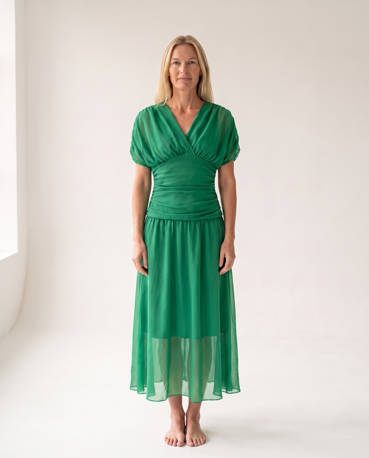 Woman wearing off shoulder maxi dress