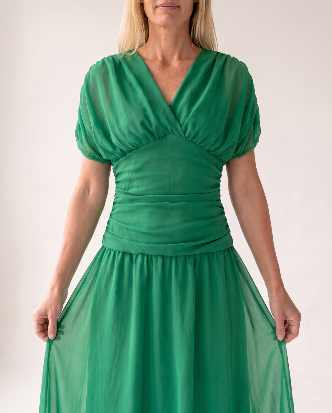 Woman wearing off shoulder maxi dress
