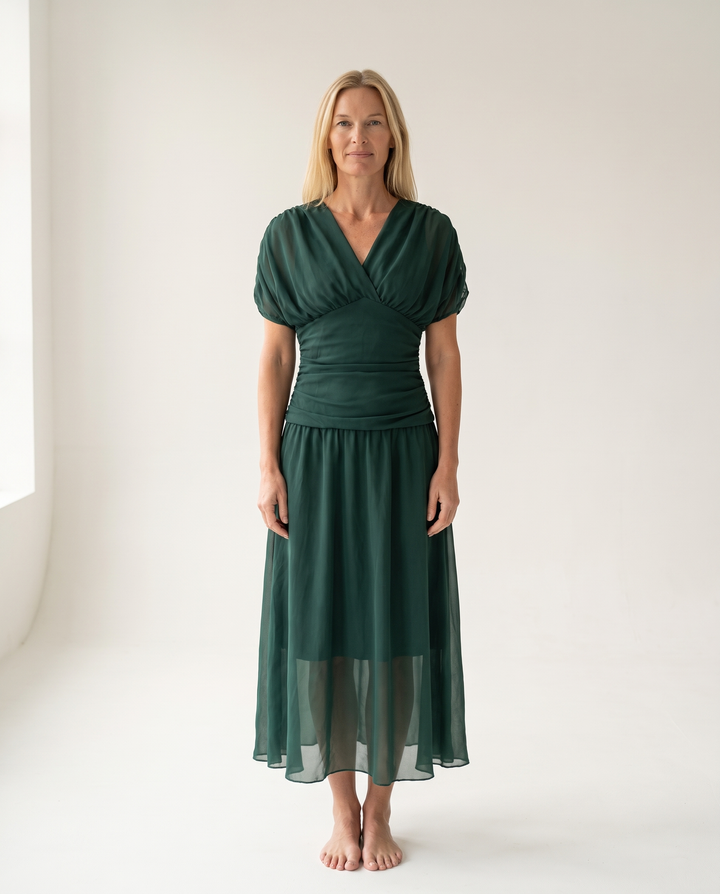 Woman wearing off shoulder maxi dress