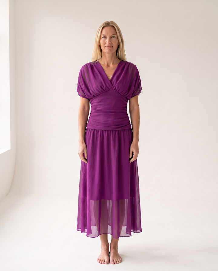 Woman wearing off shoulder maxi dress