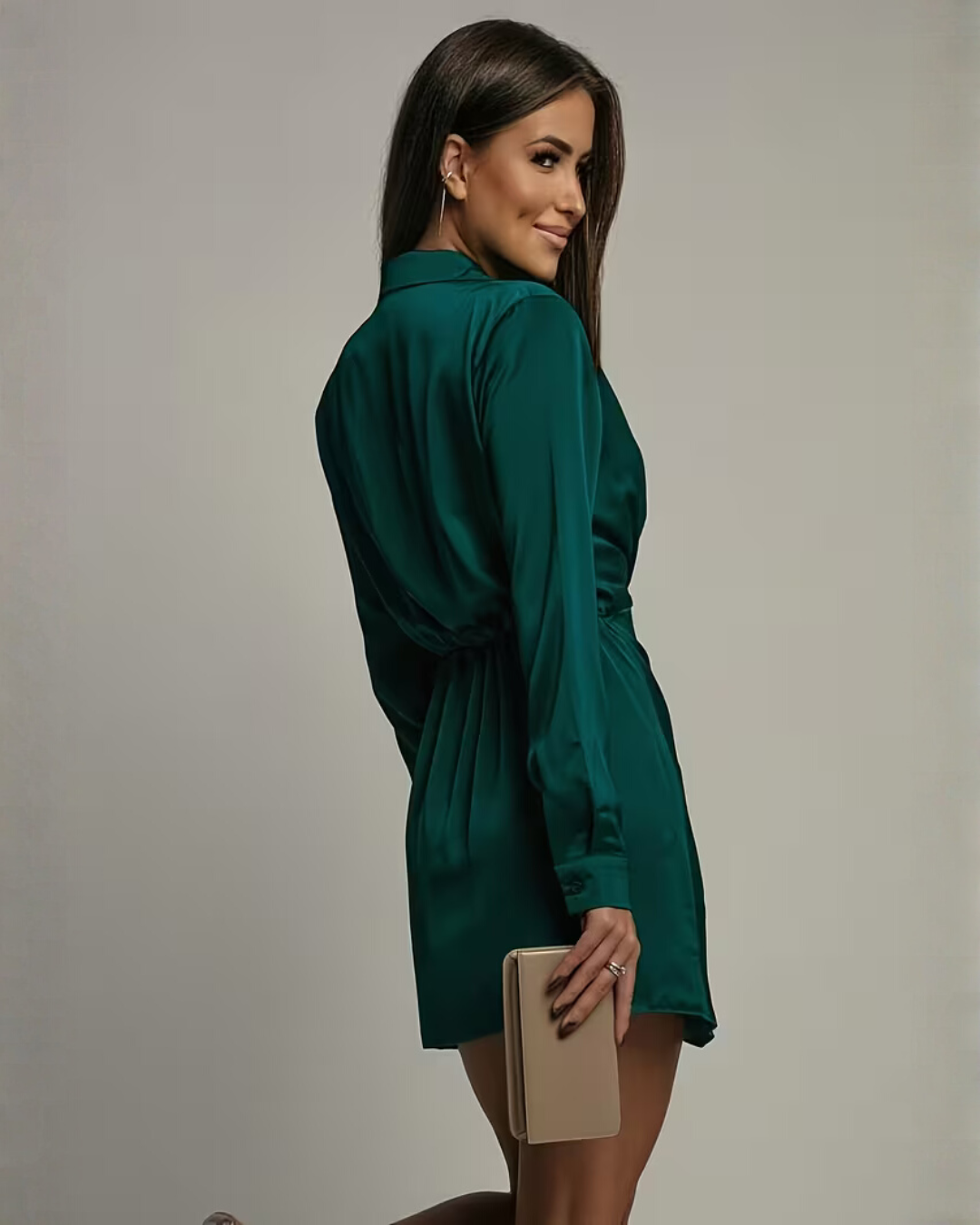 Woman wearing satin wrap mini dress