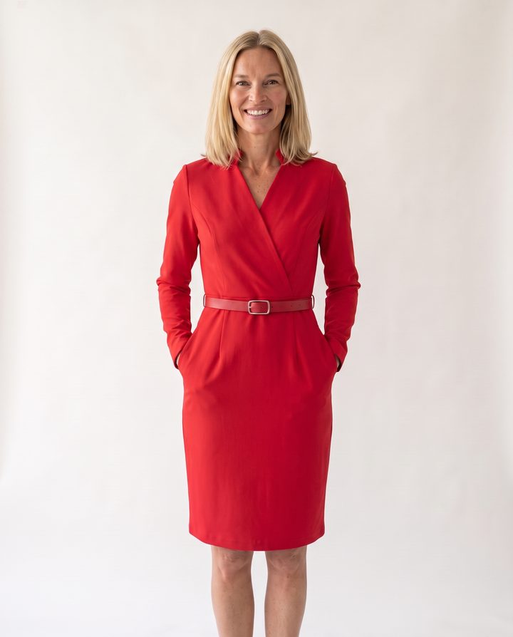 Woman wearing elegant belted midi dress