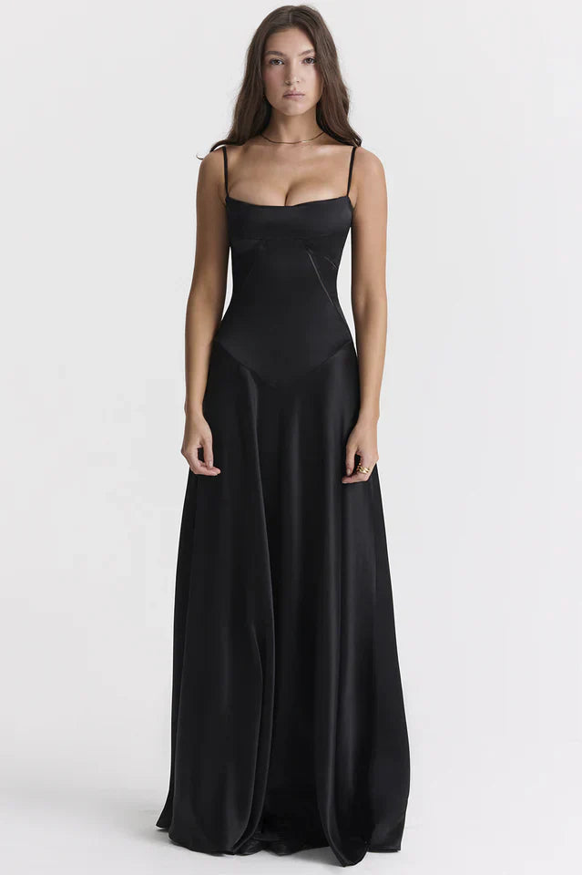 Woman wearing elegant satin maxi dress