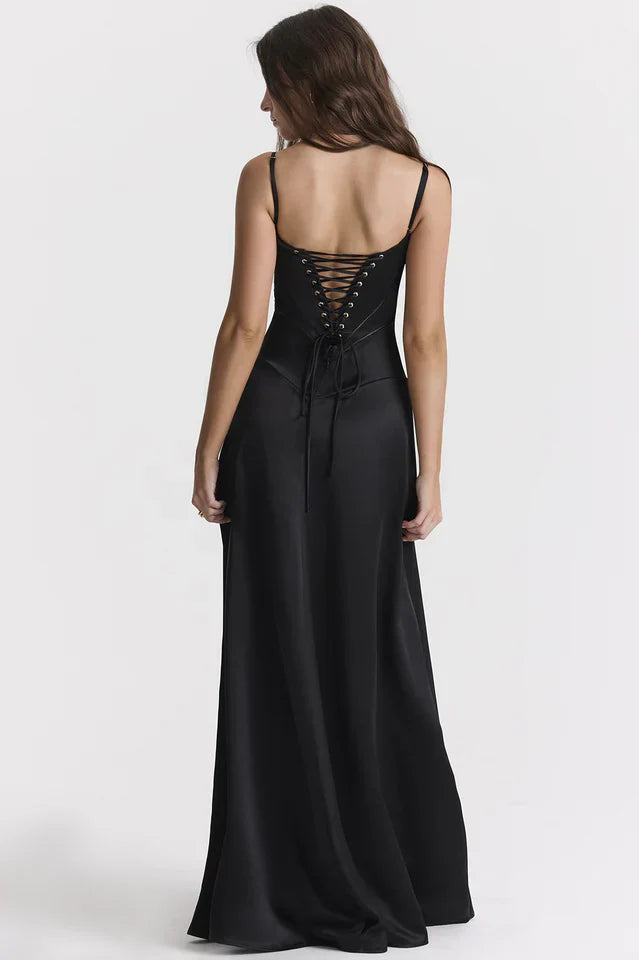 Woman wearing elegant satin maxi dress