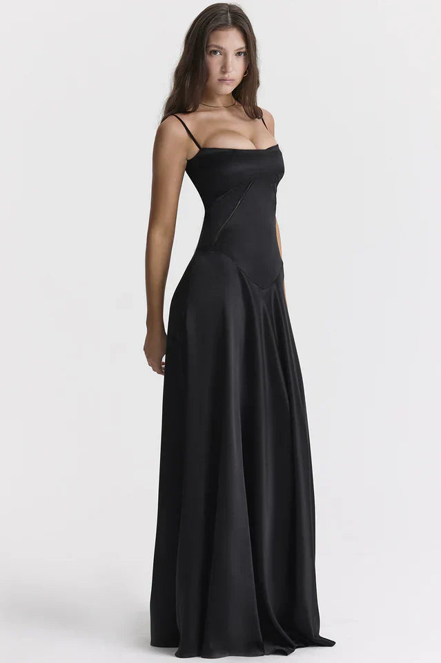 Woman wearing elegant satin maxi dress