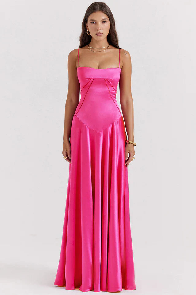 Woman wearing elegant satin maxi dress