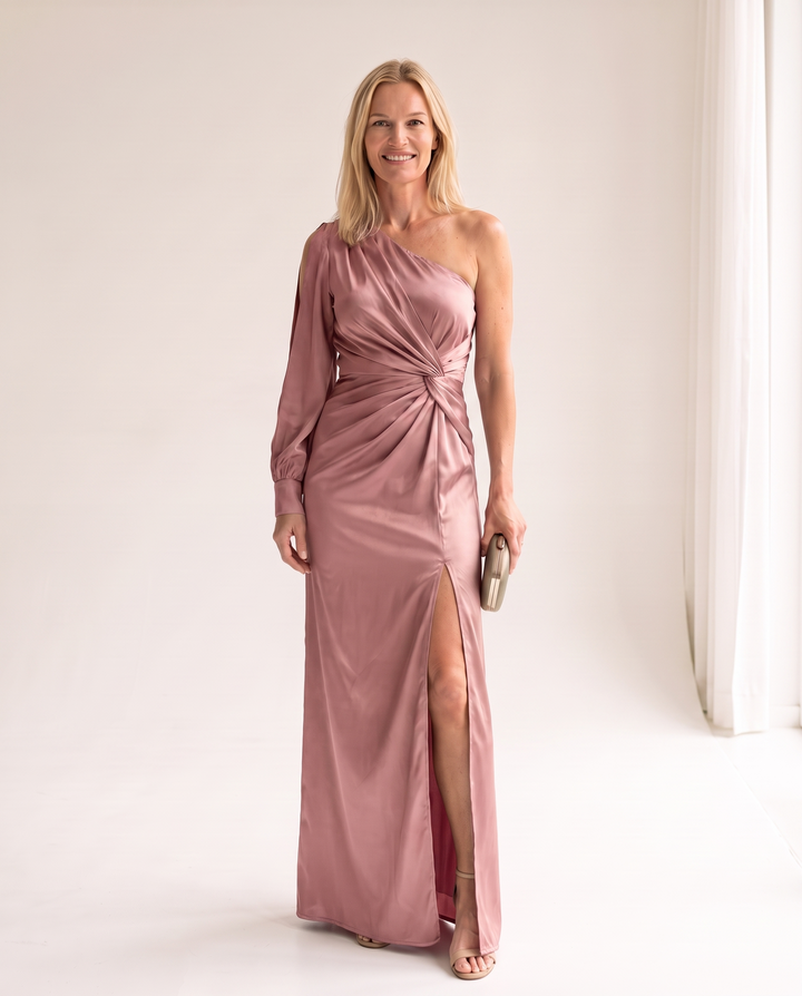 Woman wearing one shoulder satin evening dress