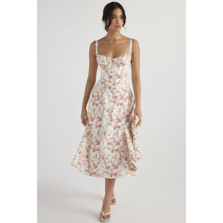 Woman wearing floral corset midi dress