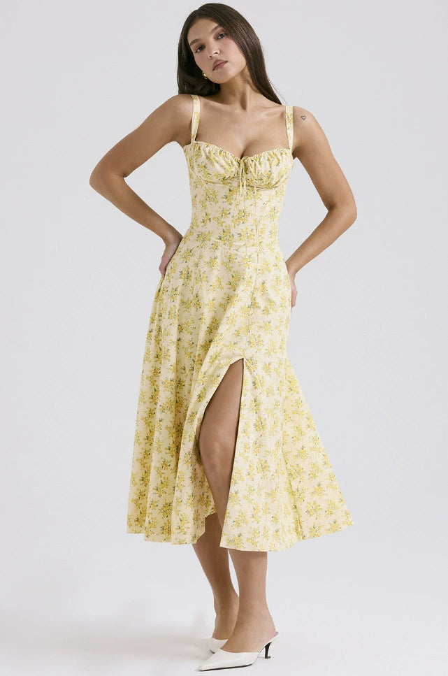 Woman wearing floral corset midi dress