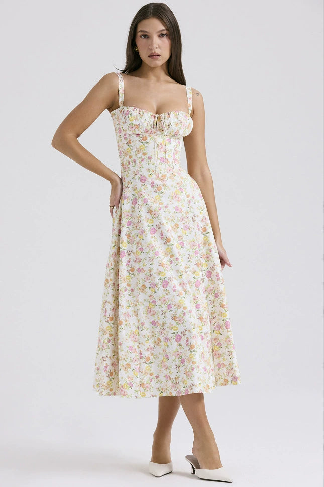 Woman wearing floral corset midi dress