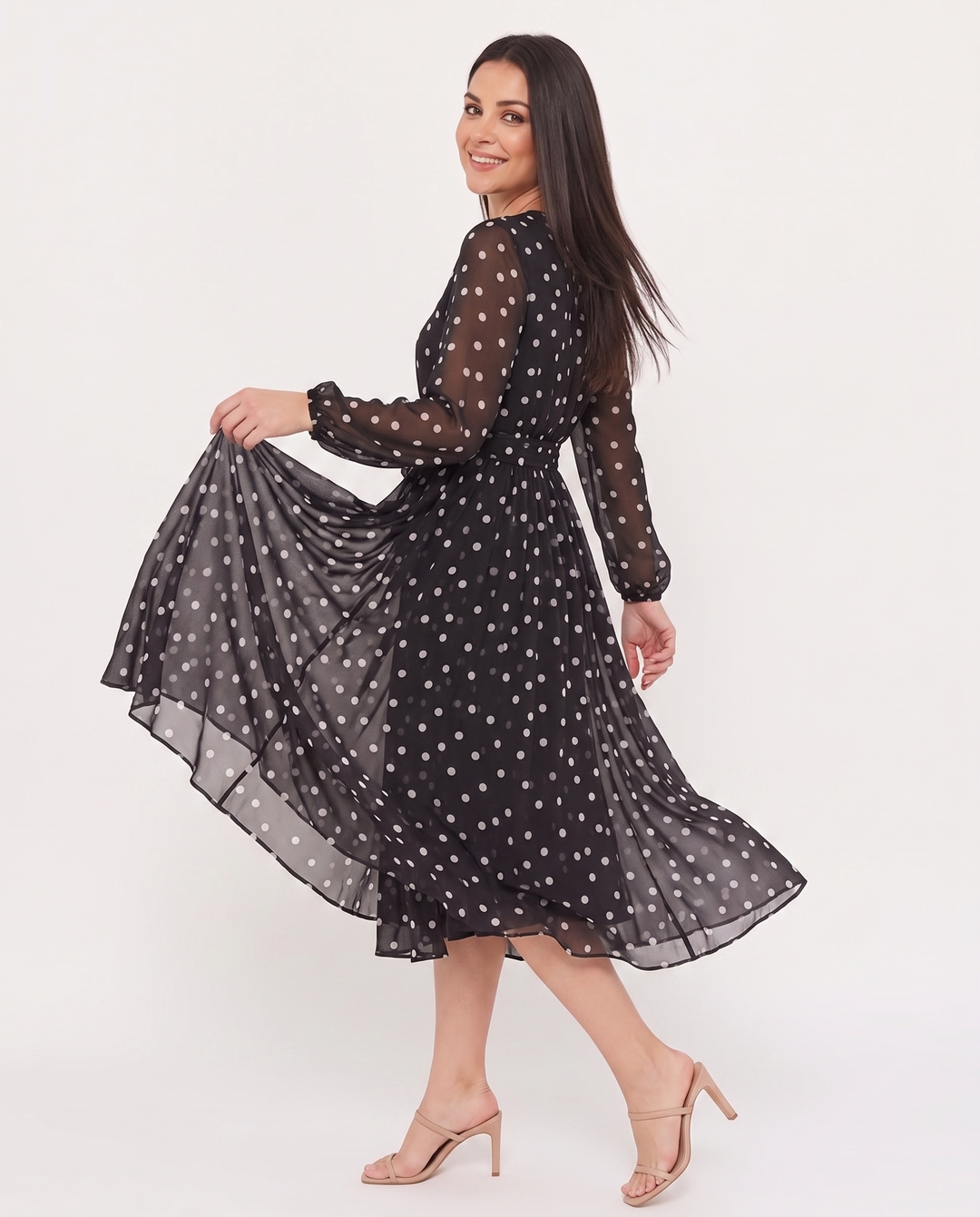 Woman wearing polka dot midi dress