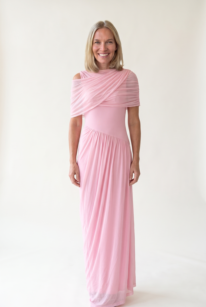 Woman wearing off shoulder maxi evening dress