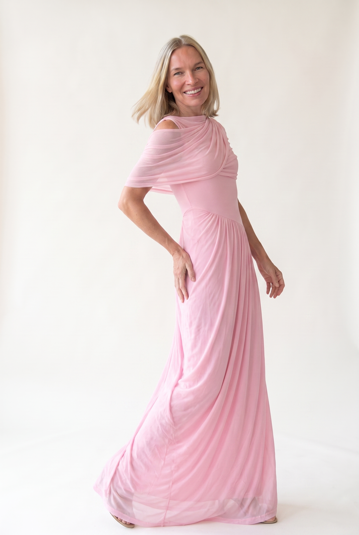 Woman wearing off shoulder maxi evening dress