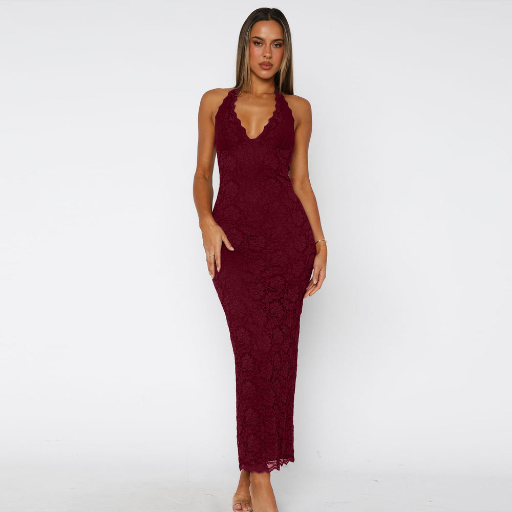Woman wearing black lace halter backless maxi dress