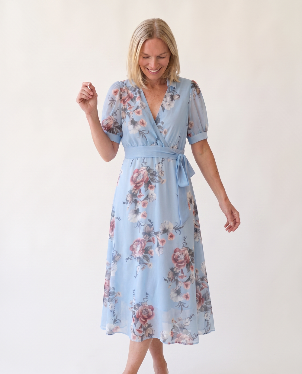 Woman wearing floral maxi wrap dress