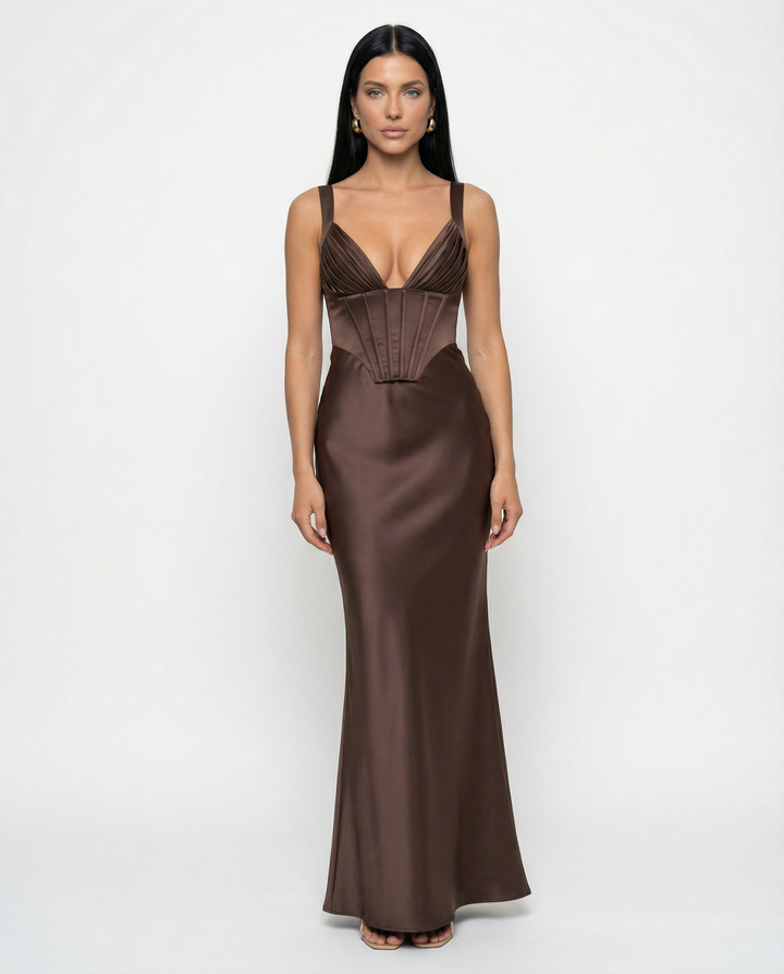 Woman wearing satin corset maxi dress