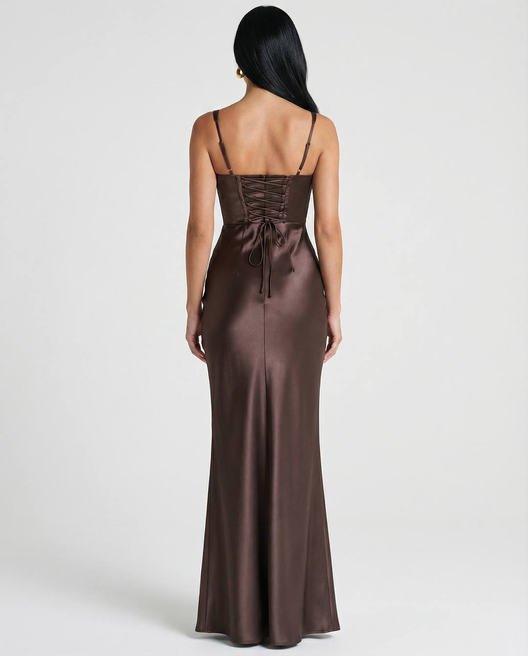 Woman wearing satin corset maxi dress