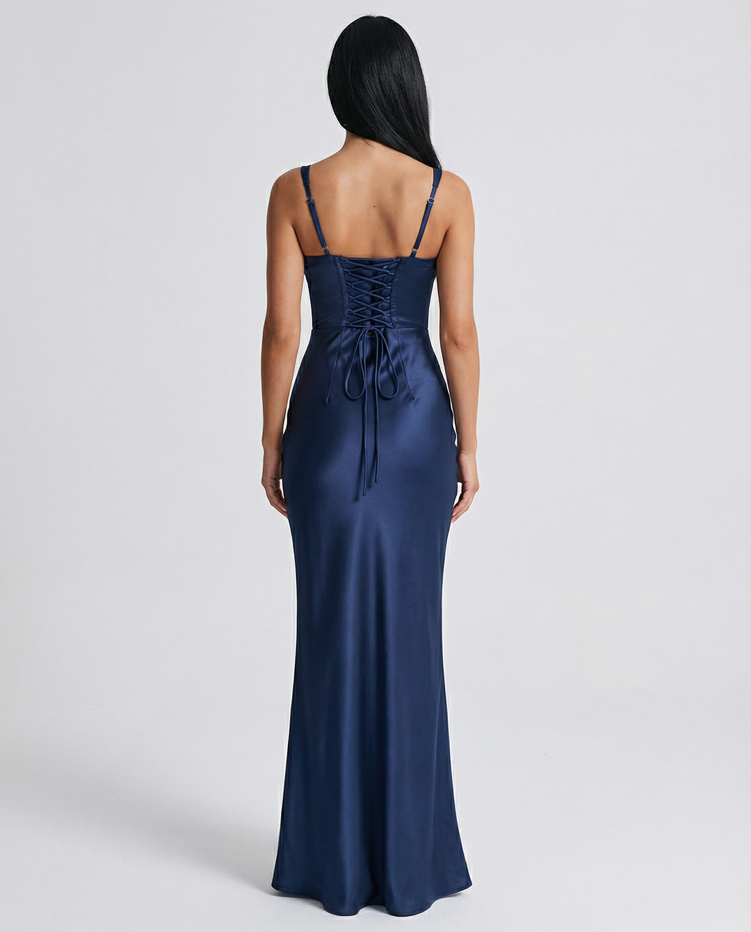 Woman wearing satin corset maxi dress
