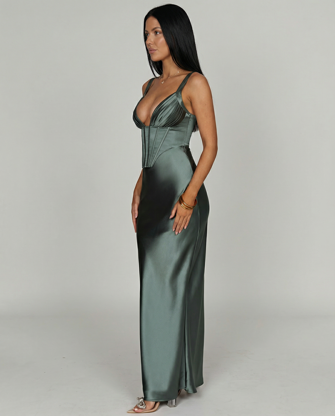 Woman wearing satin corset maxi dress