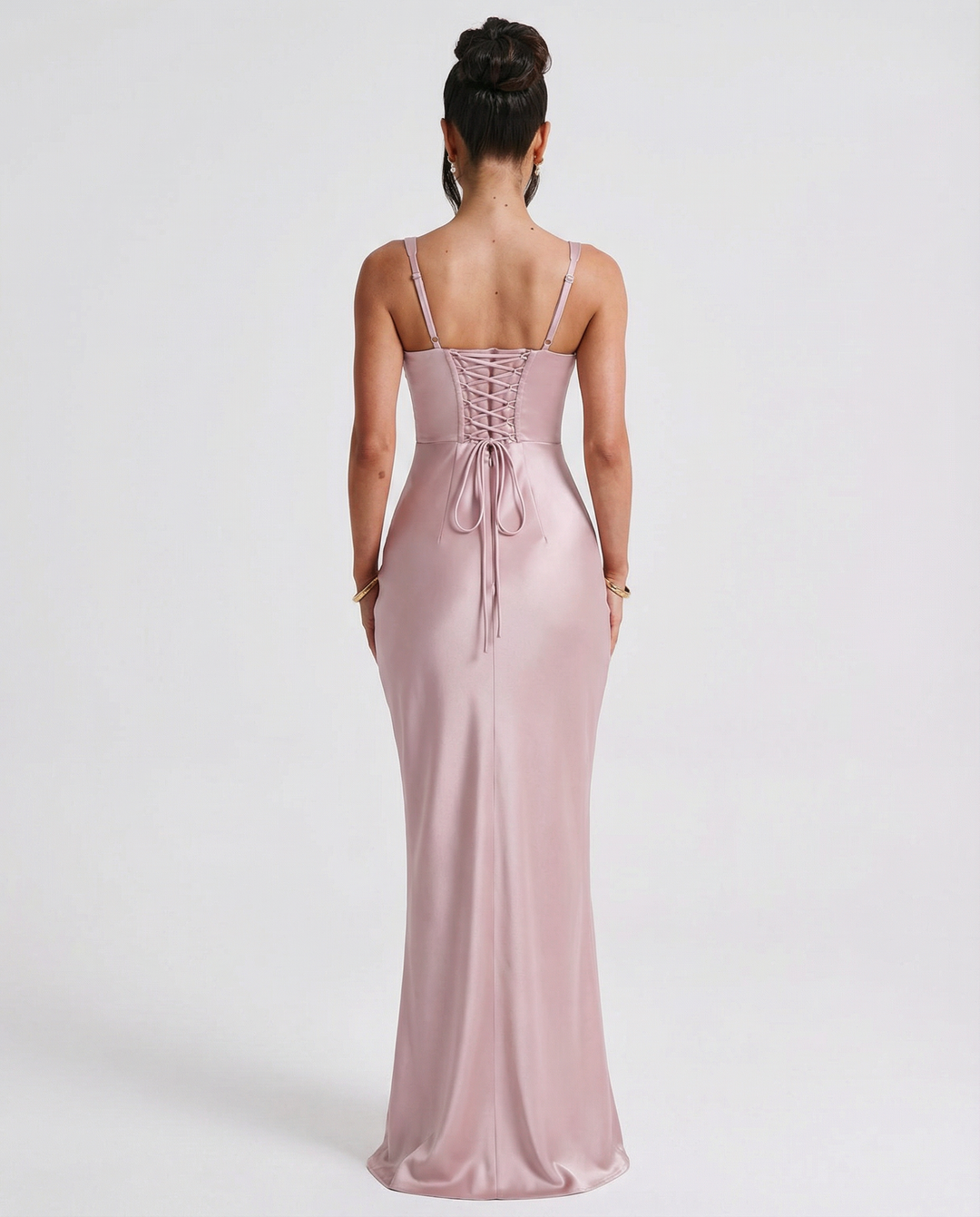 Woman wearing satin corset maxi dress