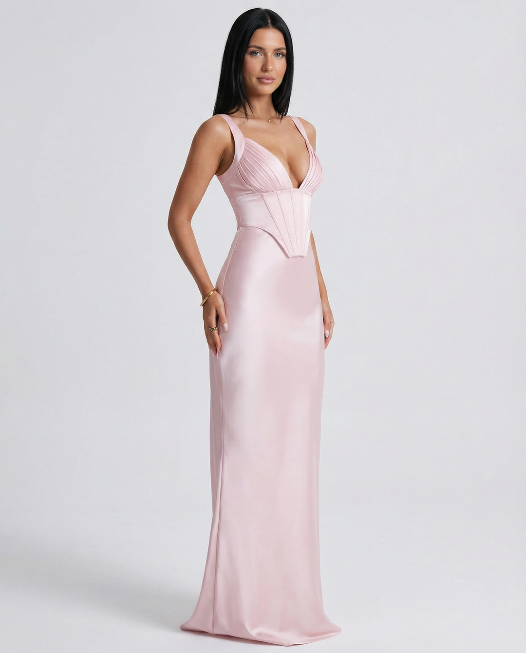 Woman wearing satin corset maxi dress